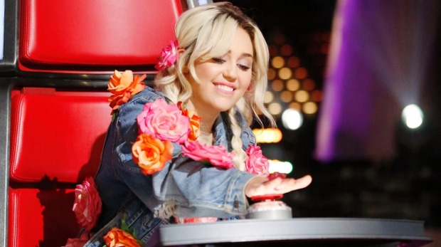 New+coach+Miley+Cyrus+pushes+her+button+enthusiastically+to+turn+her+chair+in+hopes+of+gaining+a+talented+singer+for+her+team+during+the+Blind+Audition+rounds.