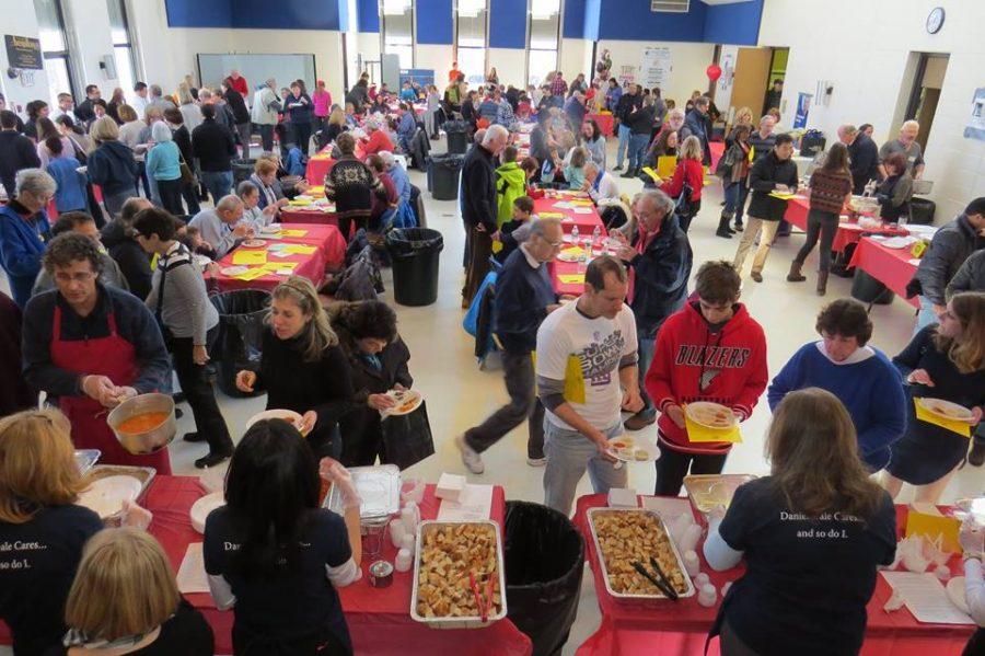 Community+members+gather+to+sample+a+variety+of+soups+from+local+restaurants+at+the+Souper+Bowl+on+Feb.+4.