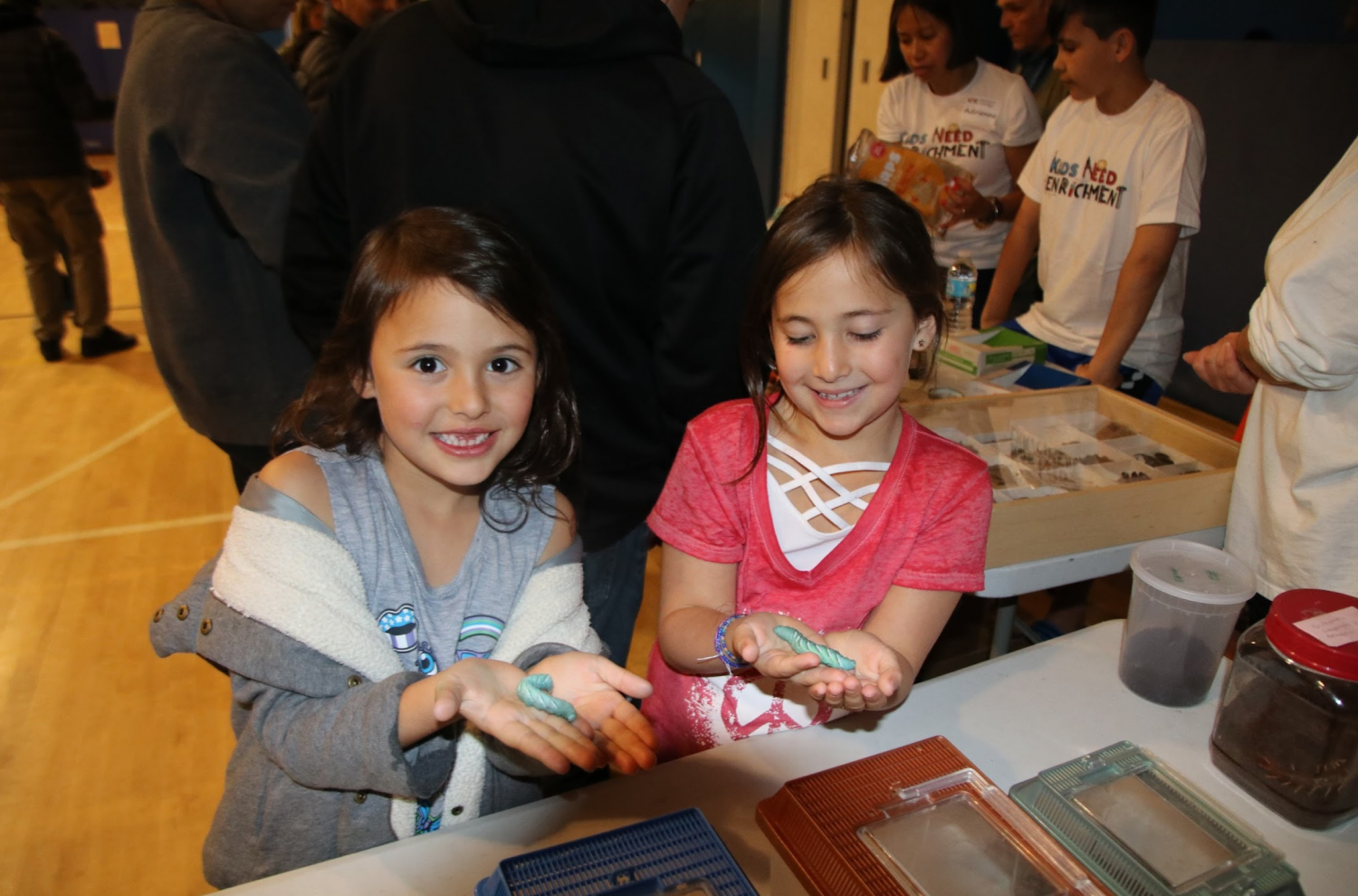 Manorhaven elementary school students learned about different types of insects and hold live caterpillars at the Insects and Arachnids station. Louis Sorkin from the American Museum of Natural History showed children the unique anatomy and adaptations of different species of insects.