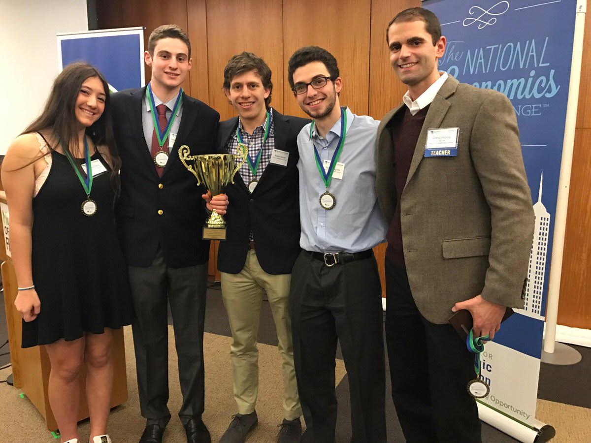 Seniors+Danielle+Elkins%2C+Michael+Nachman%2C+Rob+Konoff%2C+Dylan+Langone+won+first+place+at+the+National+Economics+Challenge.