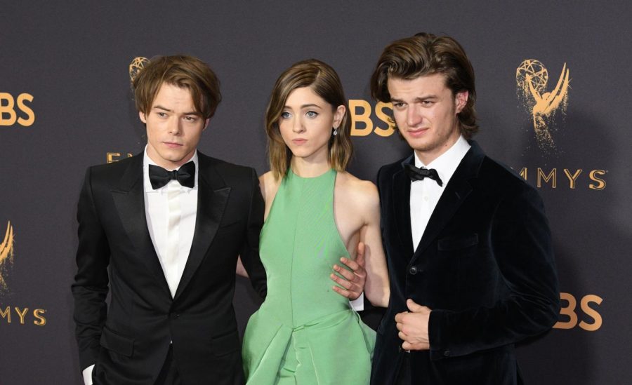 The stars of Stranger Things, Charlie Heaton, Natalia Dyer, and Joe Keery pose for a picture at the Emmys. Fans excitedly await the release of Stranger Things on Netflix on October 27.