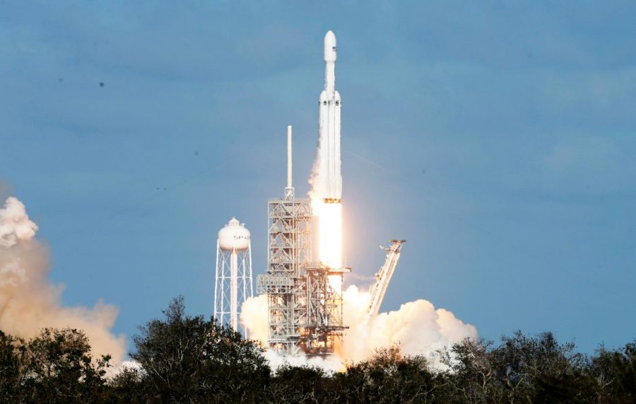 The+Falcon+Heavy+launches+from+Cape+Canaveral%2C+Florida+on+Tuesday%2C+February+6th.+The+rocket+was+carrying+a+Tesla+Roadster+and+was+being+tested+as+the+most+powerful+rocket+in+the+world.