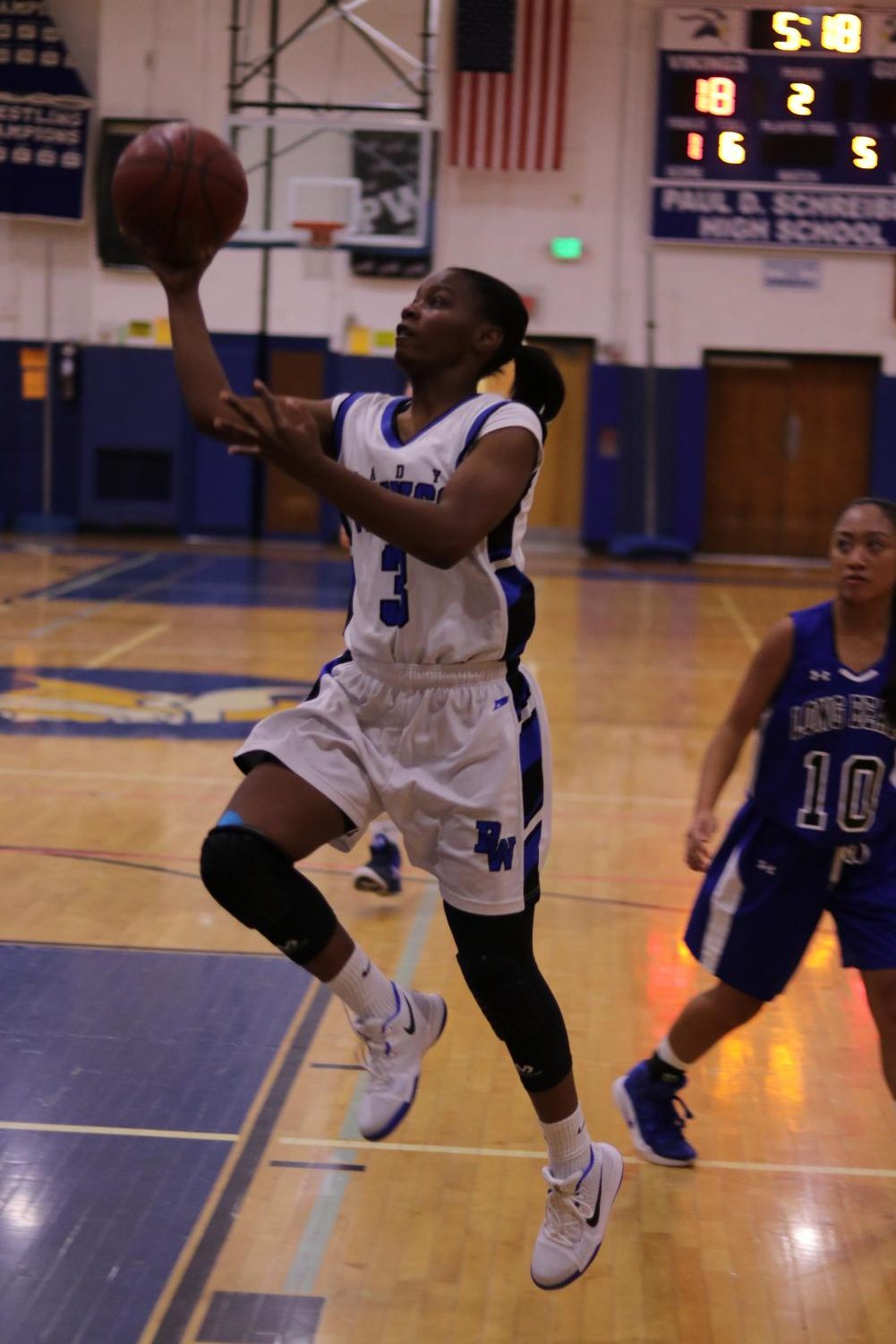 Senior Tyler Owens goes up for a layup in a home game against Long Beach on Dec. 14. The Lady Vikings went on to win the game 41-15.