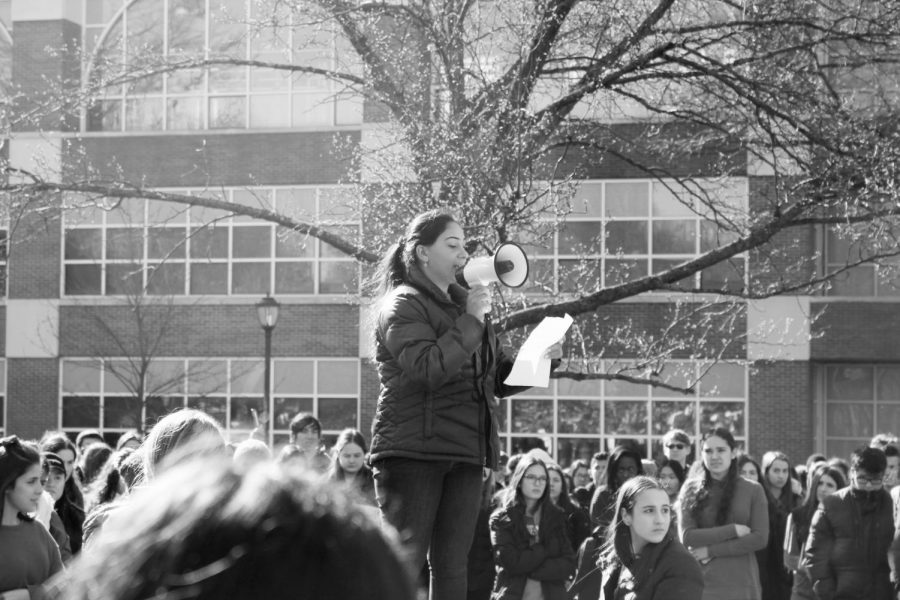 On March 14, students left their classrooms to participate in the nationwide walkout. Pictured above is Eve Harari, reading the names of the Parkland victims.