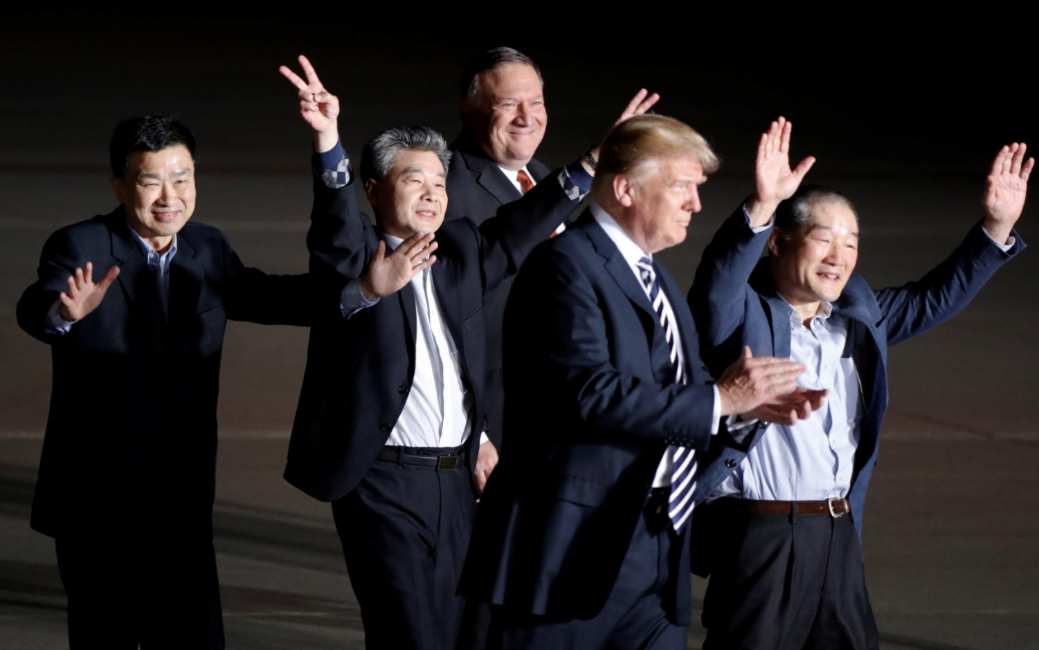 In Washington, D.C. President Donald Trum (front) and Secretary of State Mike Pompeo (rear) welcome home three detainees released from North Korea.