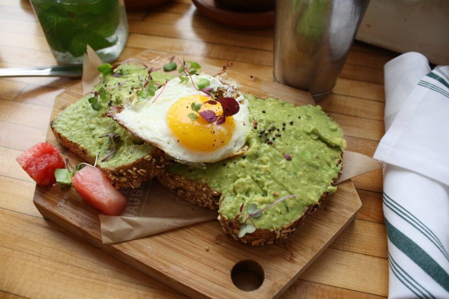 The+Butchers+Daughter+is+the+perfect+spot+for+all+things+avocado+toast.+Pictured+about%2C+this+avocado+toast+is+topped+with+an+egg+and+a+special+garnish.