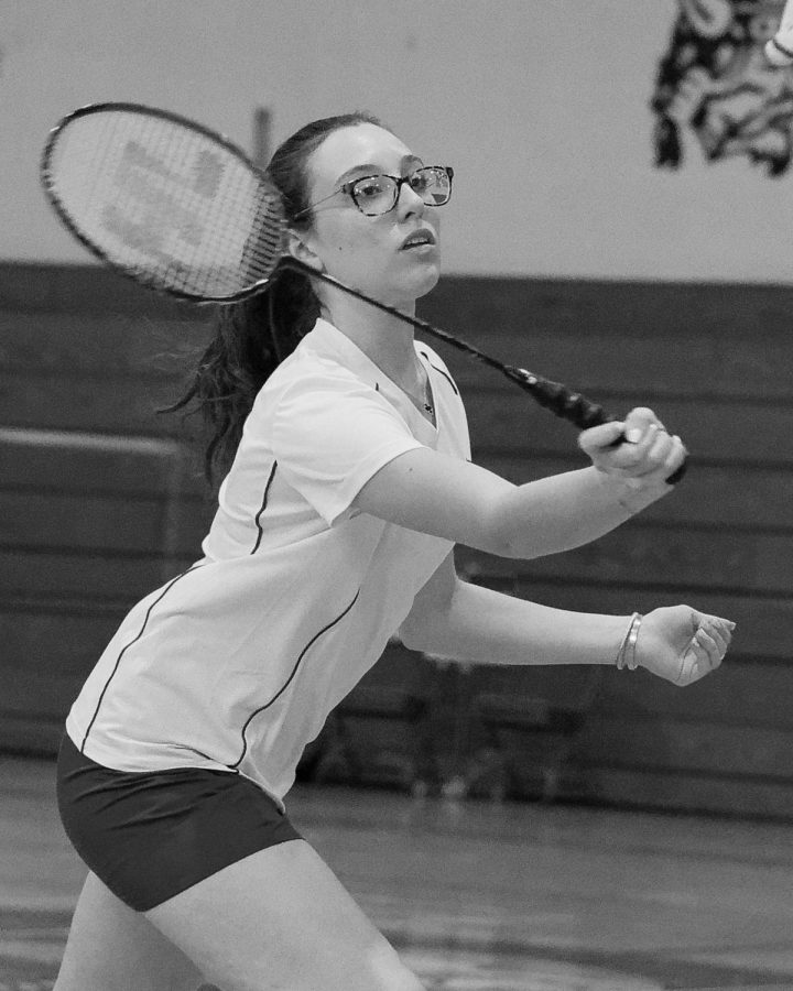 Senior+Mia+Froccaro+goes+for+the+birdie+during+a+match+against+East+Meadow+on+April+19.+The+badminton+team+is+one+of+the+schools+only+all+girls+teams+