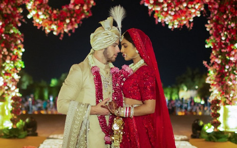 Pop singer Nick Jonas faces his bride Priyanka Chopra with love and showers her with affection as the couple marry at the Taj Umaid Bhavan Palace in Jodhpur, India.
