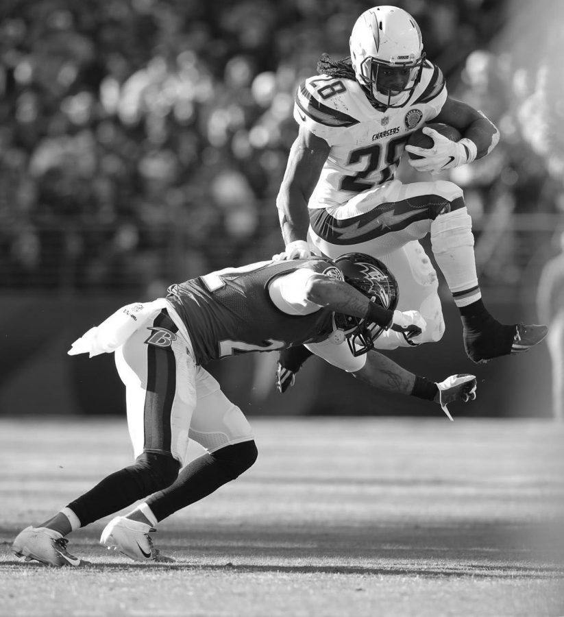 Los Angeles Chargers running back, Melvin Gordan, attempts to hurdle a defender in the NFC Divisional Round, on Jan. 6, 2019, which the Chargers won 23-17.