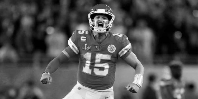Patrick Mahomes celebrates during Super Bowl LIV in which he led the Chiefs to a historical victory.